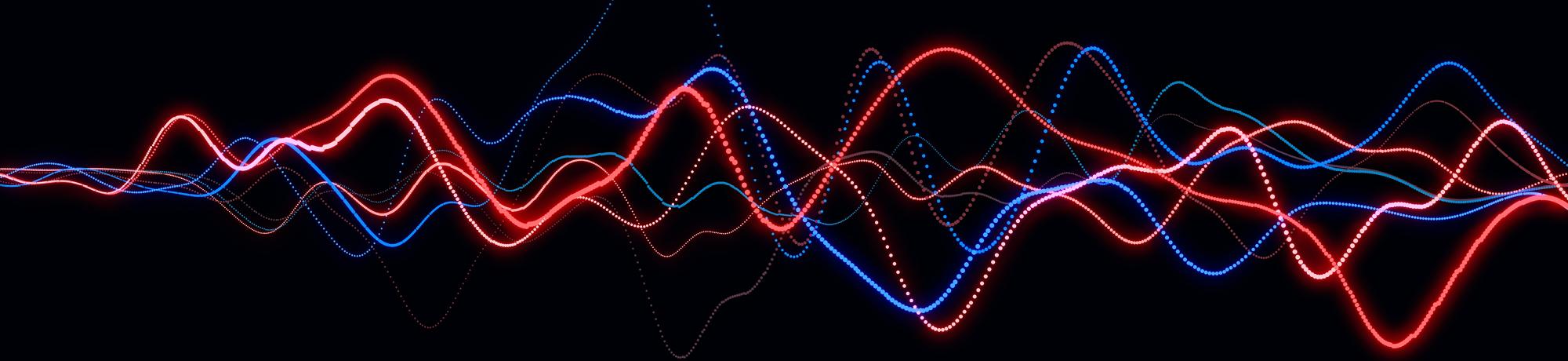 Red amd blue glowing electric waves on dark background.